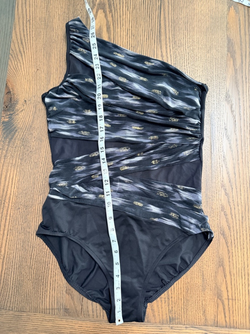 One-Shoulder Black Swimsuit with Metallic Accents